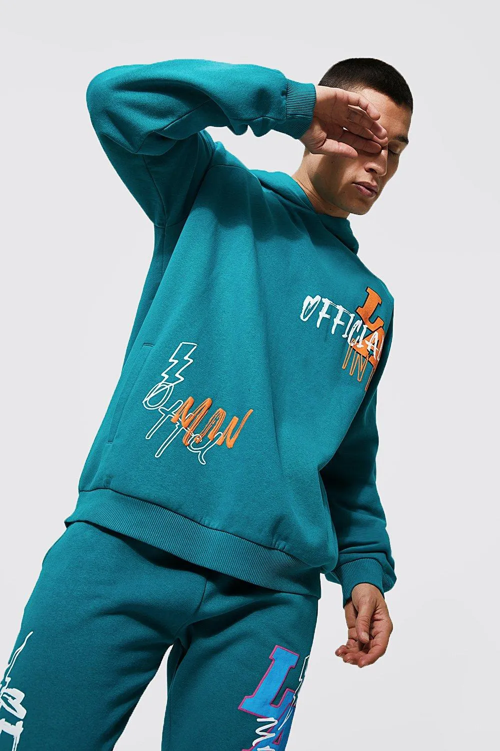 Oversized La Varsity Graffiti Hoodie | boohooMAN UK