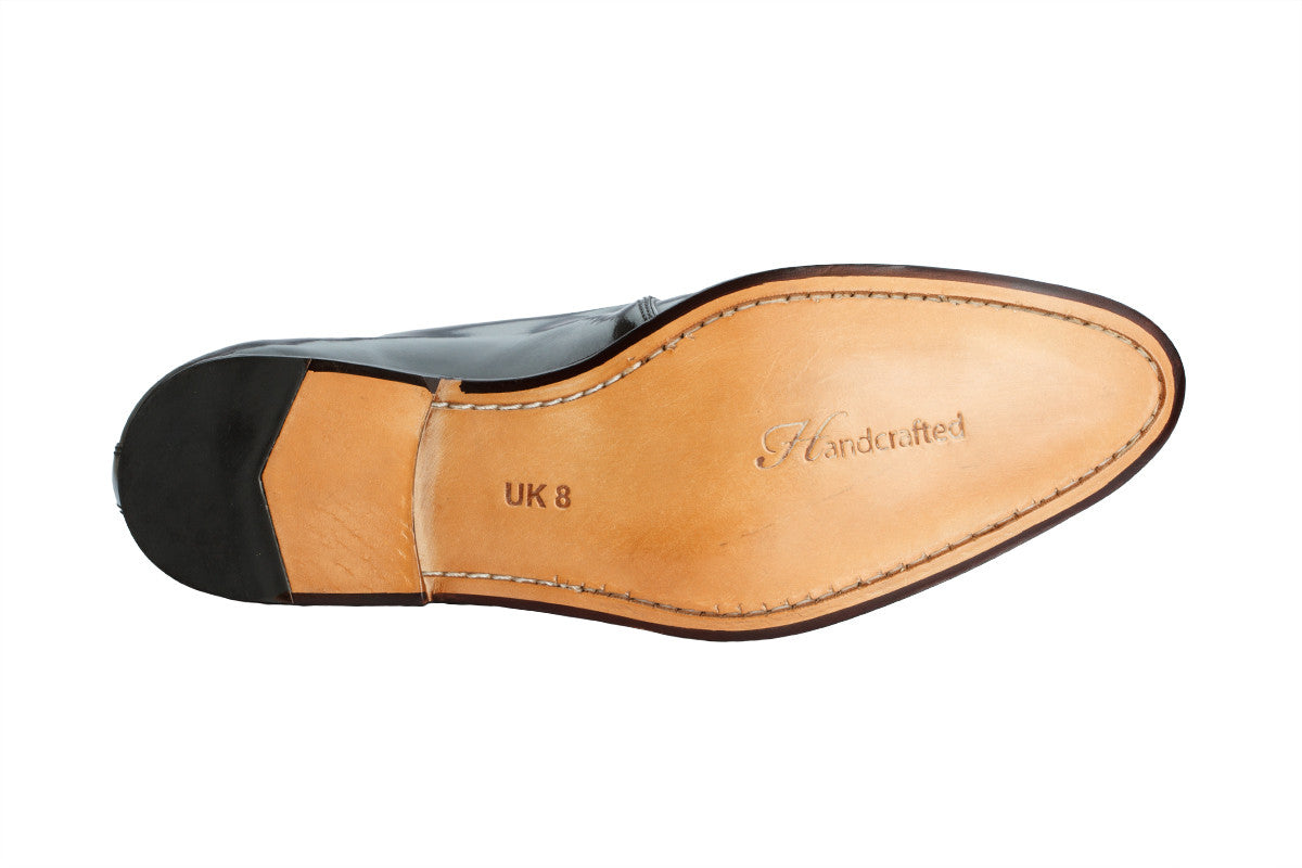 WING CAP SINGLE STRAP BROGUE MONK WITH MEDALLION- BRUSH OFF BLACK